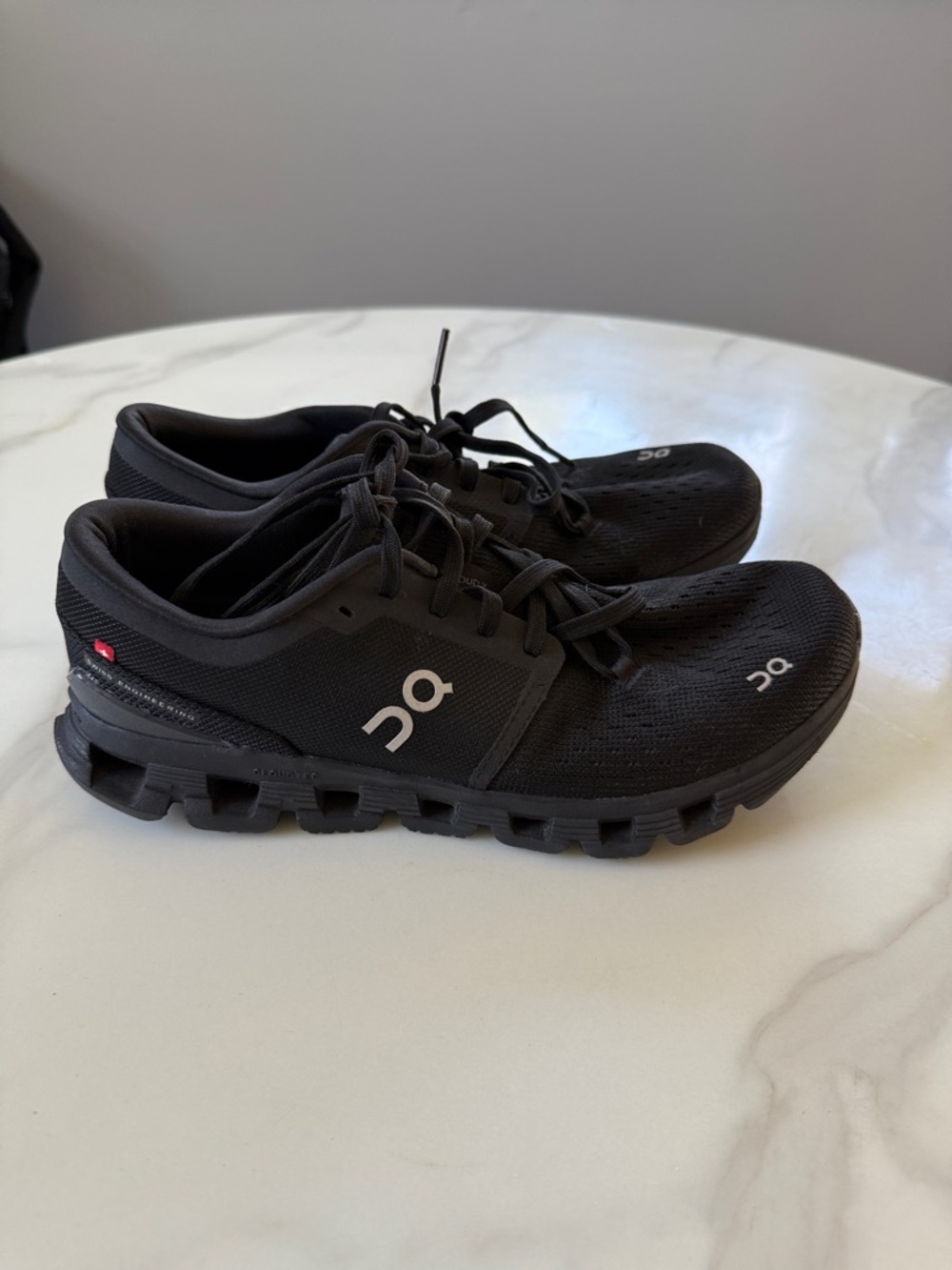 On Running Men's Cloud Sneakers in Black with White Logo